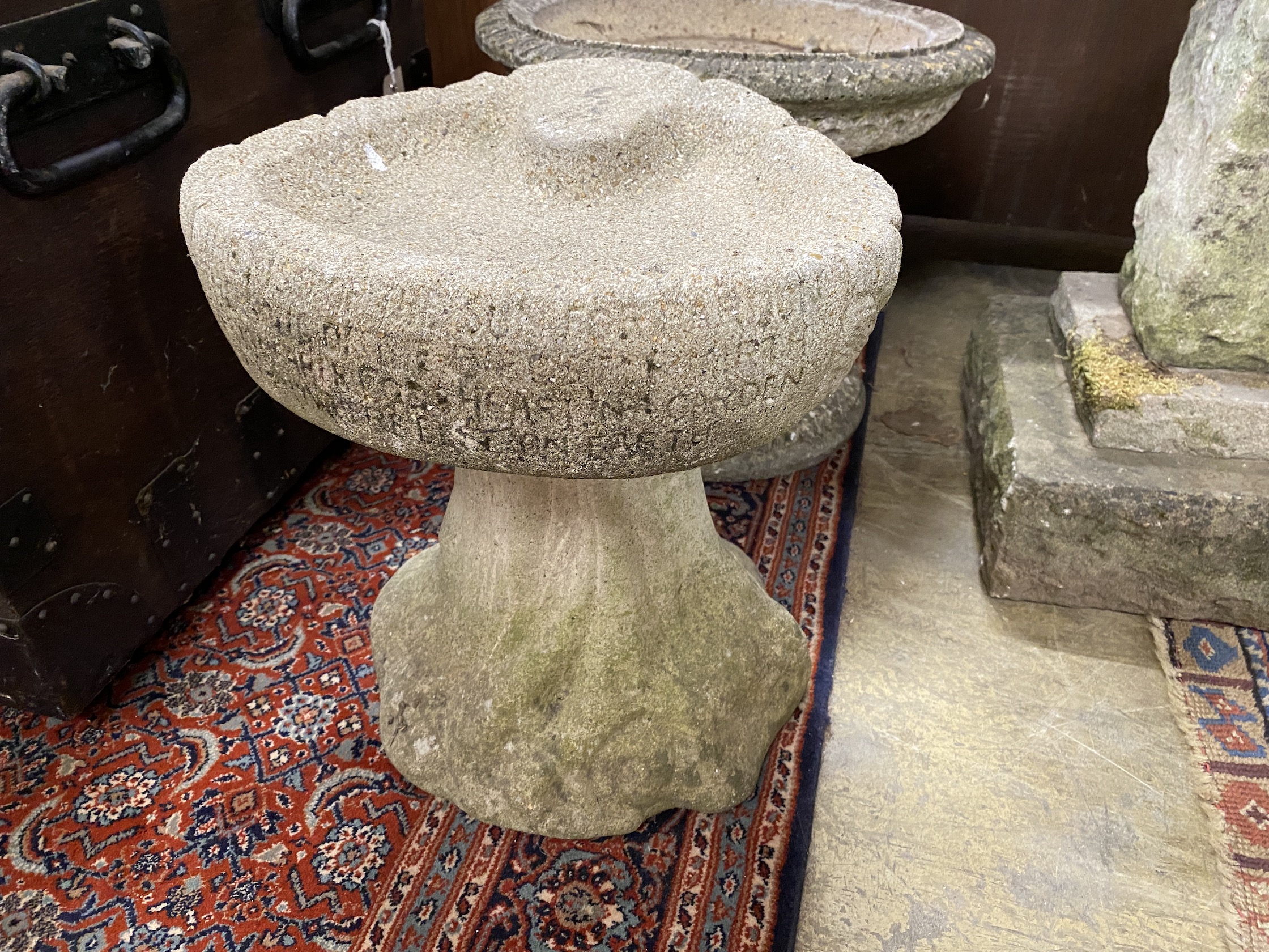 Two reconstituted stone bird baths, larger diameter 47cm and height 36cm